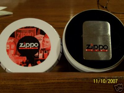 Click image for larger version. 

Name:	Zippo_Click_2002_Member_Lighter.jpg 
Views:	73 
Size:	19,5 KB 
ID:	10243