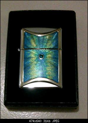 Click image for larger version. 

Name:	zippo nice with crystal.jpg 
Views:	20 
Size:	31,1 KB 
ID:	4961